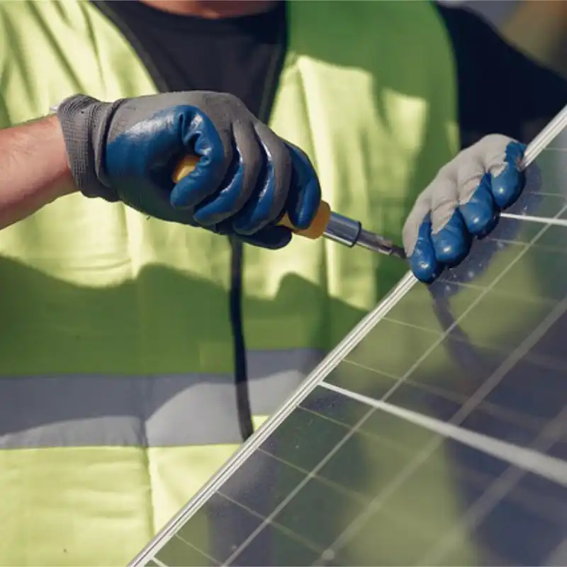 Electrician working on solar panels
